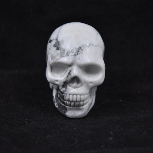 Howlite Crystal Skull Reiki Healing Stone for home decoration.