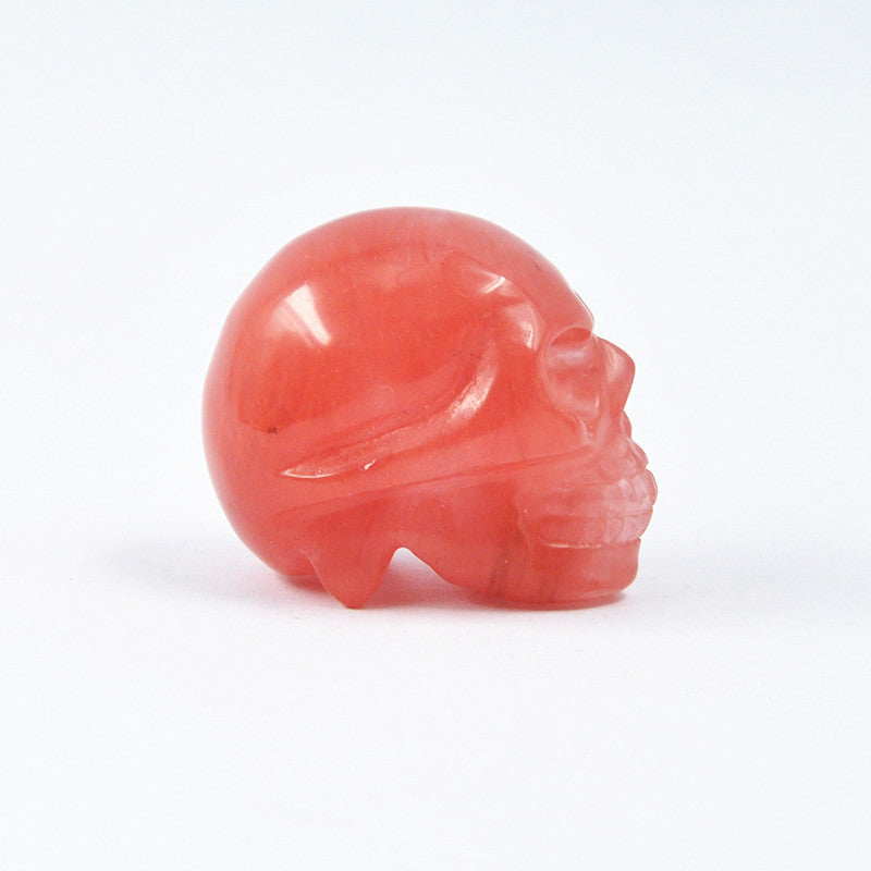 Hand Carved Natural Red Crystal Skull for Home Decoration